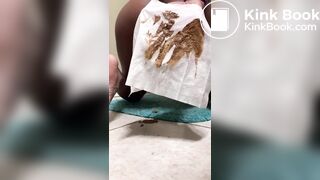 Messing her diaper pants..
