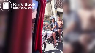 Woman Shits in Plastic Bag and Throws it at Motorcyclis