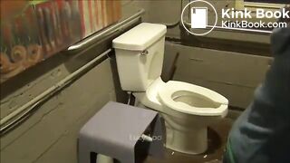 Redhead girl uses toilet