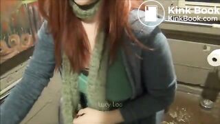 Redhead girl uses toilet