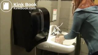 Redhead girl uses toilet