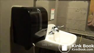 Redhead girl uses toilet