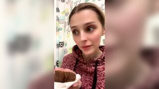 Blond girl's first time taking a big bite