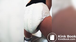 Girl shows off her messy diaper