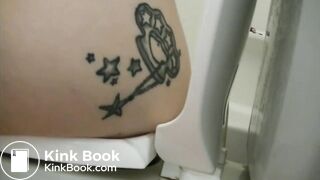 Tattooed girl toilet explosion