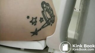 Tattooed girl toilet explosion