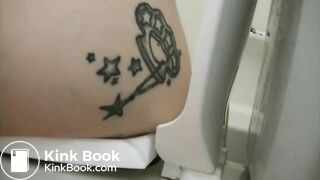Tattooed girl toilet explosion