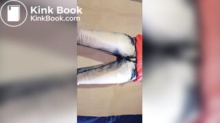 Filling her jeans with piss and shit, very messy