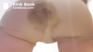 Beige panty poop under red dress