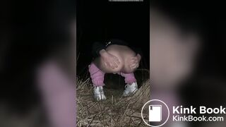 Young blonde poops outdoors at night