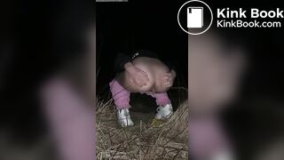 Young blonde poops outdoors at night