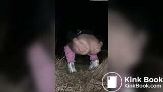 Young blonde poops outdoors at night