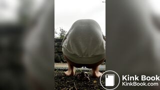 Female is diarrhea in the street