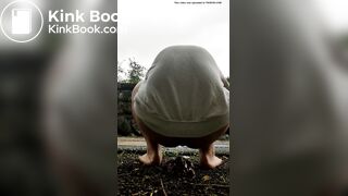 Female is diarrhea in the street