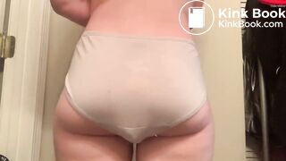 Shitting her beige panties