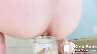 Girl filling the jar - video 2
