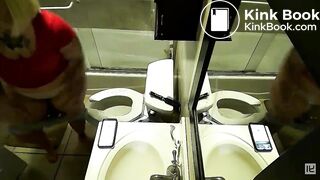 2 women pooping with reflections in a mirror