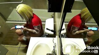 2 women pooping with reflections in a mirror