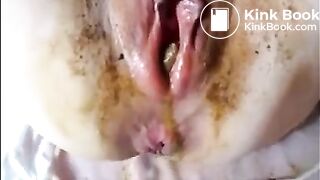 A poo in her vagina..