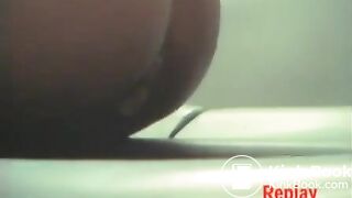 Woman uses festival porta-potty to poop