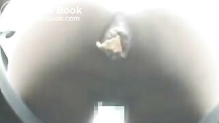 Woman uses festival porta-potty to poop