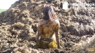 Watched on the dunghill - girl covered in cowshit