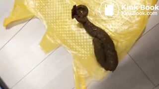 Girl shit on plastic