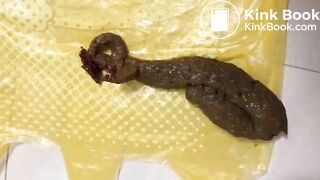Girl shit on plastic