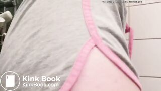 Topless diaper girl messes while wearing shorts