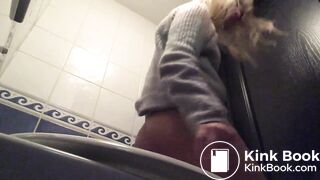 Sexy blonde pooping on public toilet