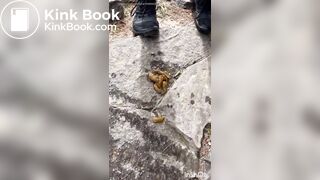 Cute girl outdoor shitting on the rocks