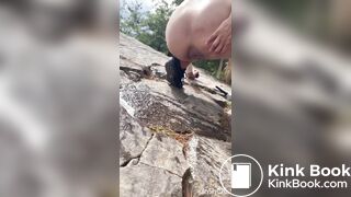 Cute girl outdoor shitting on the rocks