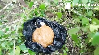 African lady pooping in the jungle..