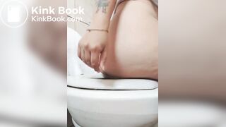 Big booty Latina plops ass on toilet and drops a dookie