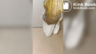 japanese girl put hand in pooped plastic glove 1