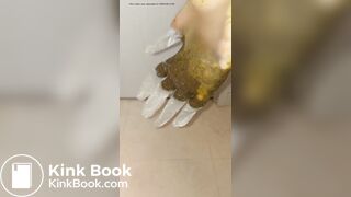 japanese girl put hand in pooped plastic glove 1