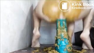 Messy anal scat play with a huge toy
