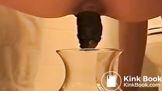 A poo in a water bowl..