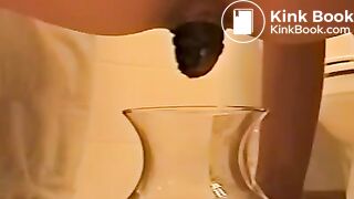 A poo in a water bowl..