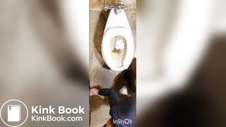 Two women shitting in public toilet