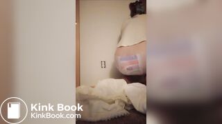 Girl releases enema in pullup