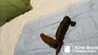 Asian girl pooping on hotel bed