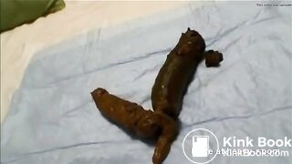 Asian girl pooping on hotel bed