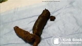 Asian girl pooping on hotel bed