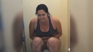 Hairy pussy girl pooping in the toilet
