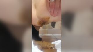 HOT MILF DROPS AMAZING SHITLOAD IN PUBLIC BATHROOM