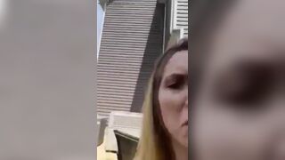 crazy bitch shits in her front yard in public view