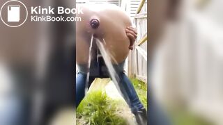 crazy bitch shits in her front yard in public view