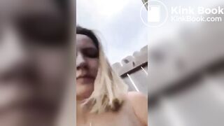 crazy bitch shits in her front yard in public view