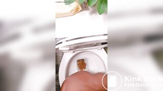 Girl poops a lot on toilet